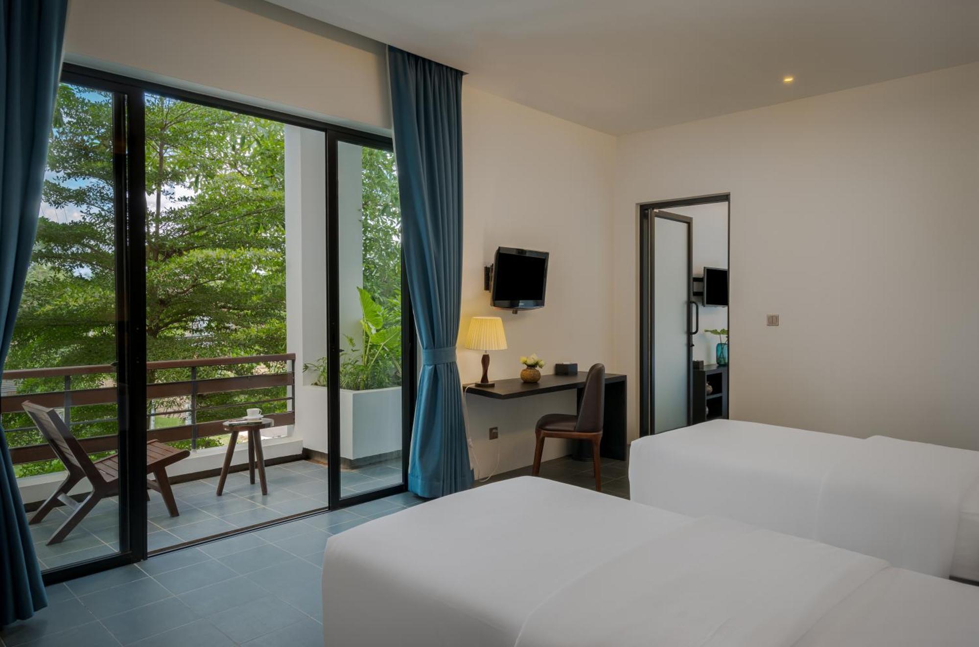 Eightfold Urban Resort Ciudad de Siem Riep Habitación foto Deluxe Room