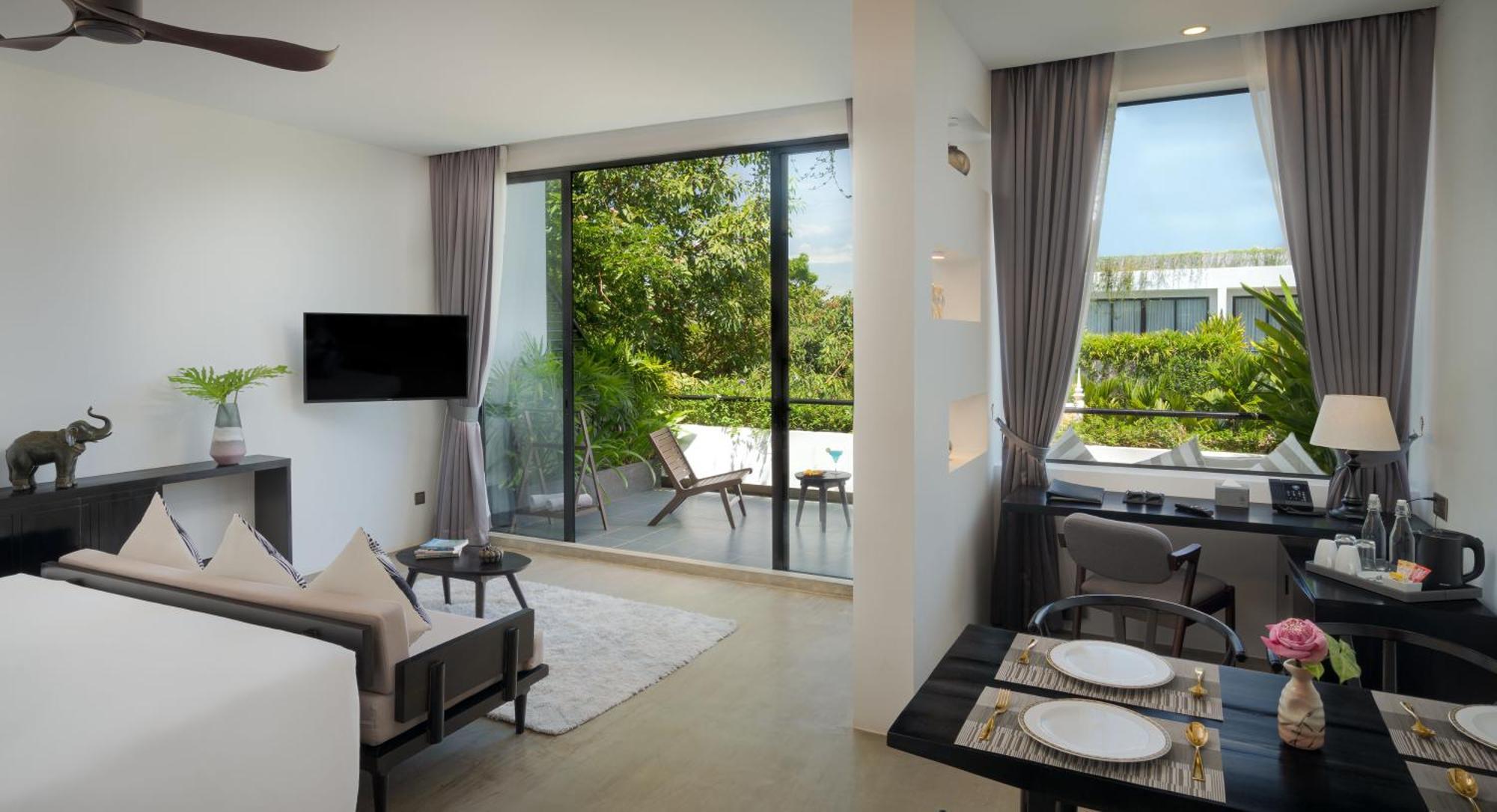 Eightfold Urban Resort Ciudad de Siem Riep Exterior foto A living room at the hotel